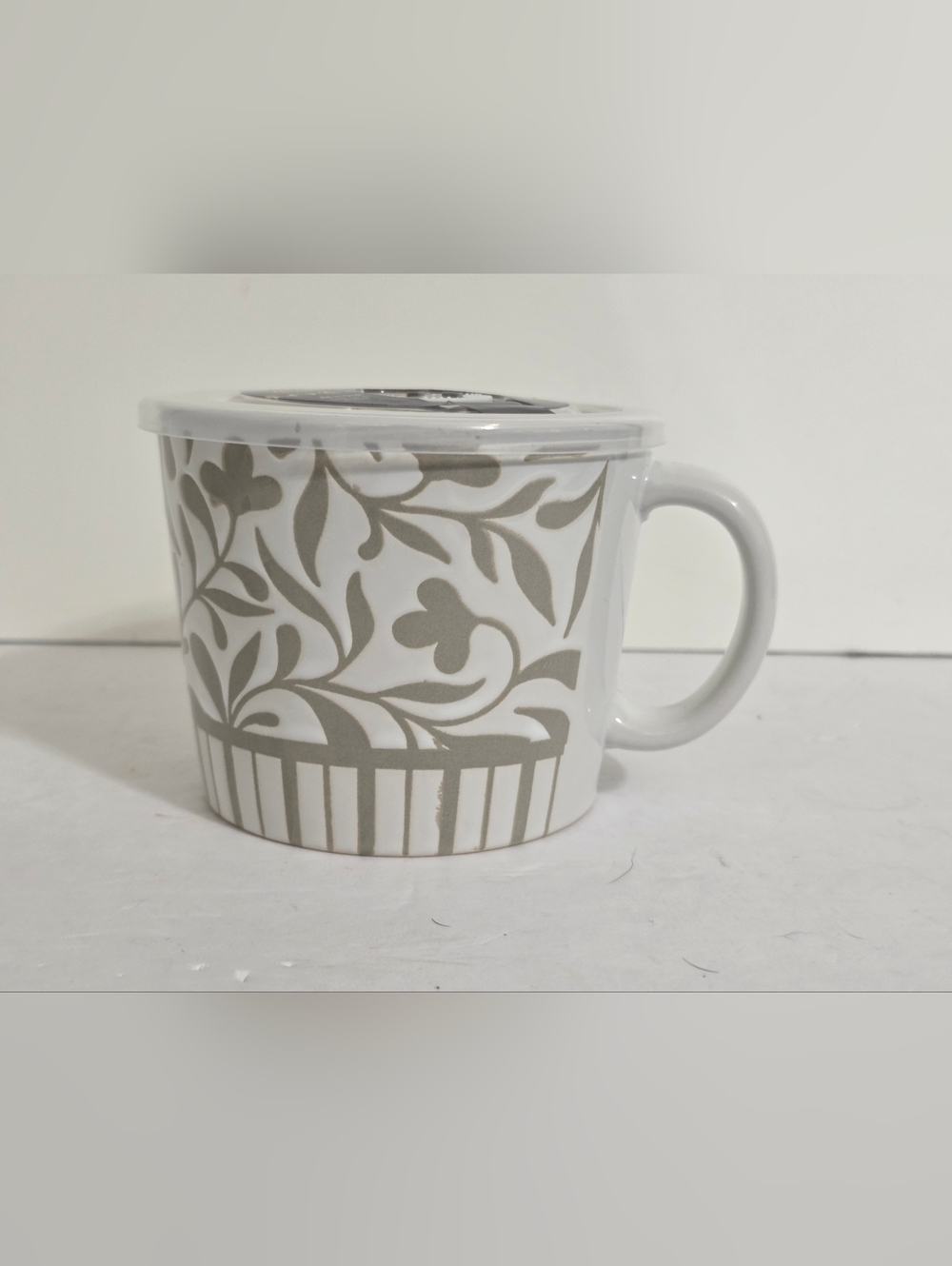 White Ceramic Mug with Gray Botanical Pattern and Lid